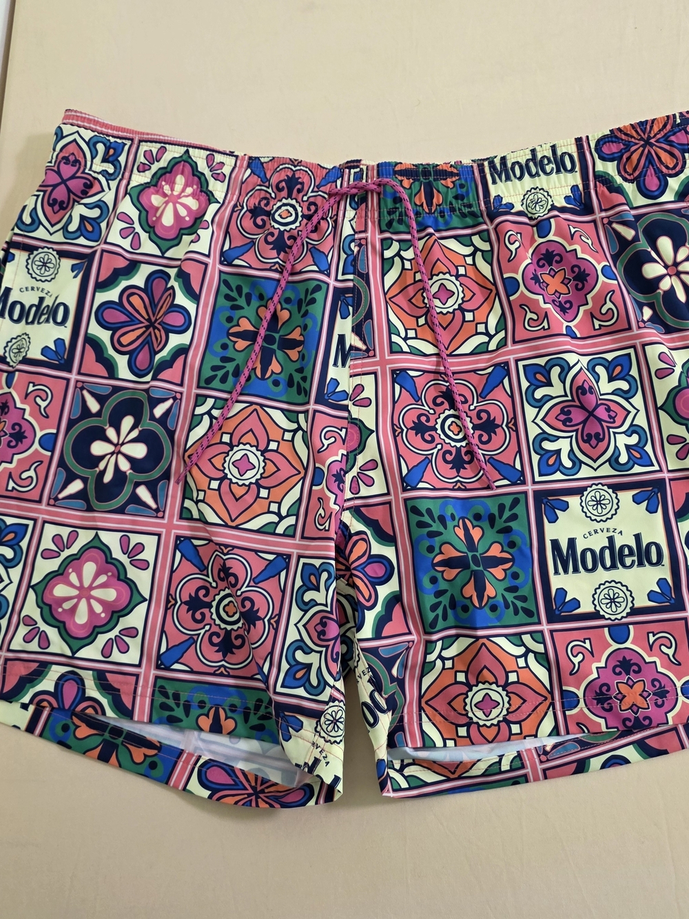 Modelo Men's Tile-Print Swim Trunks in Pink, Navy, Green, Cream